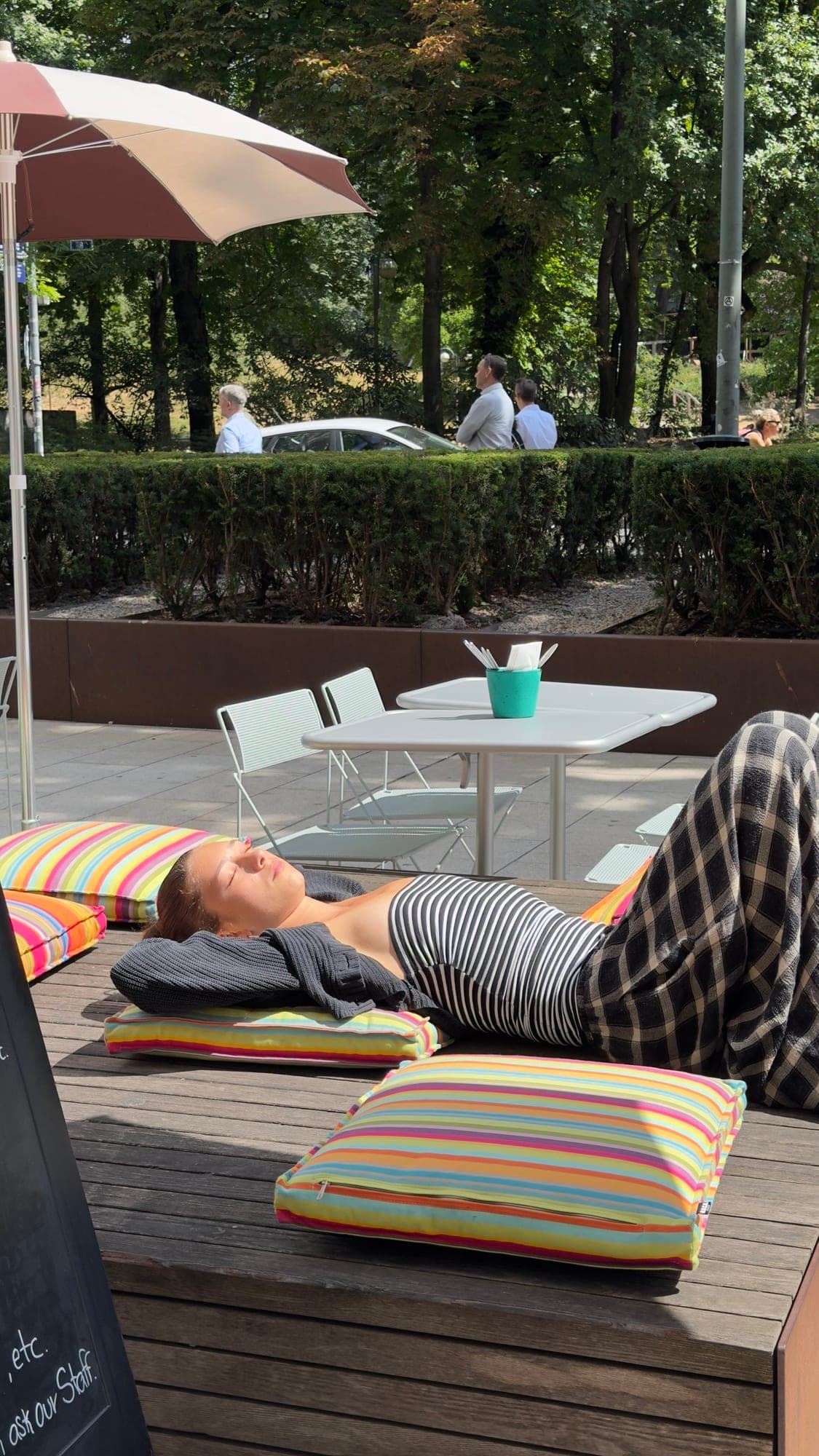Guest relaxing on the terrace cushions
