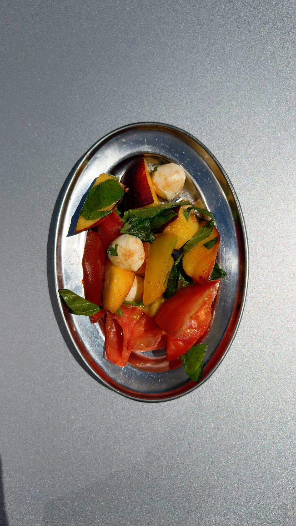 Tomatoes and mozzarella in a dish